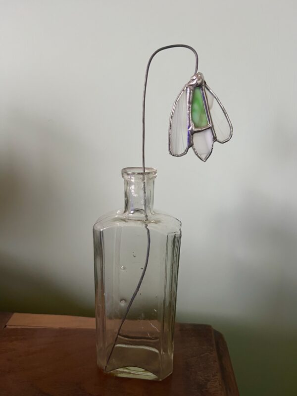 Stained glass snowdrop in bottle